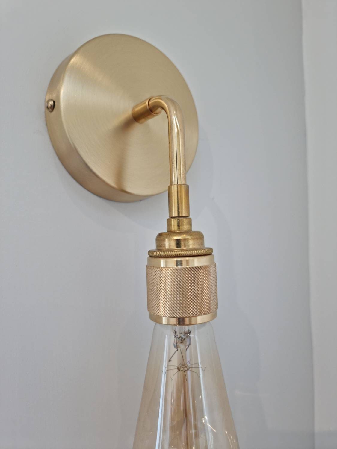 Brass angled wall light (Without bulbs)